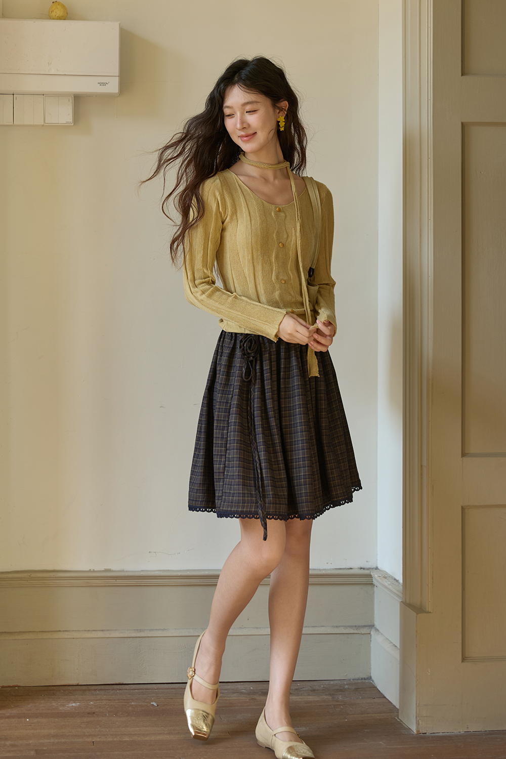 女性のためのニットシャツ