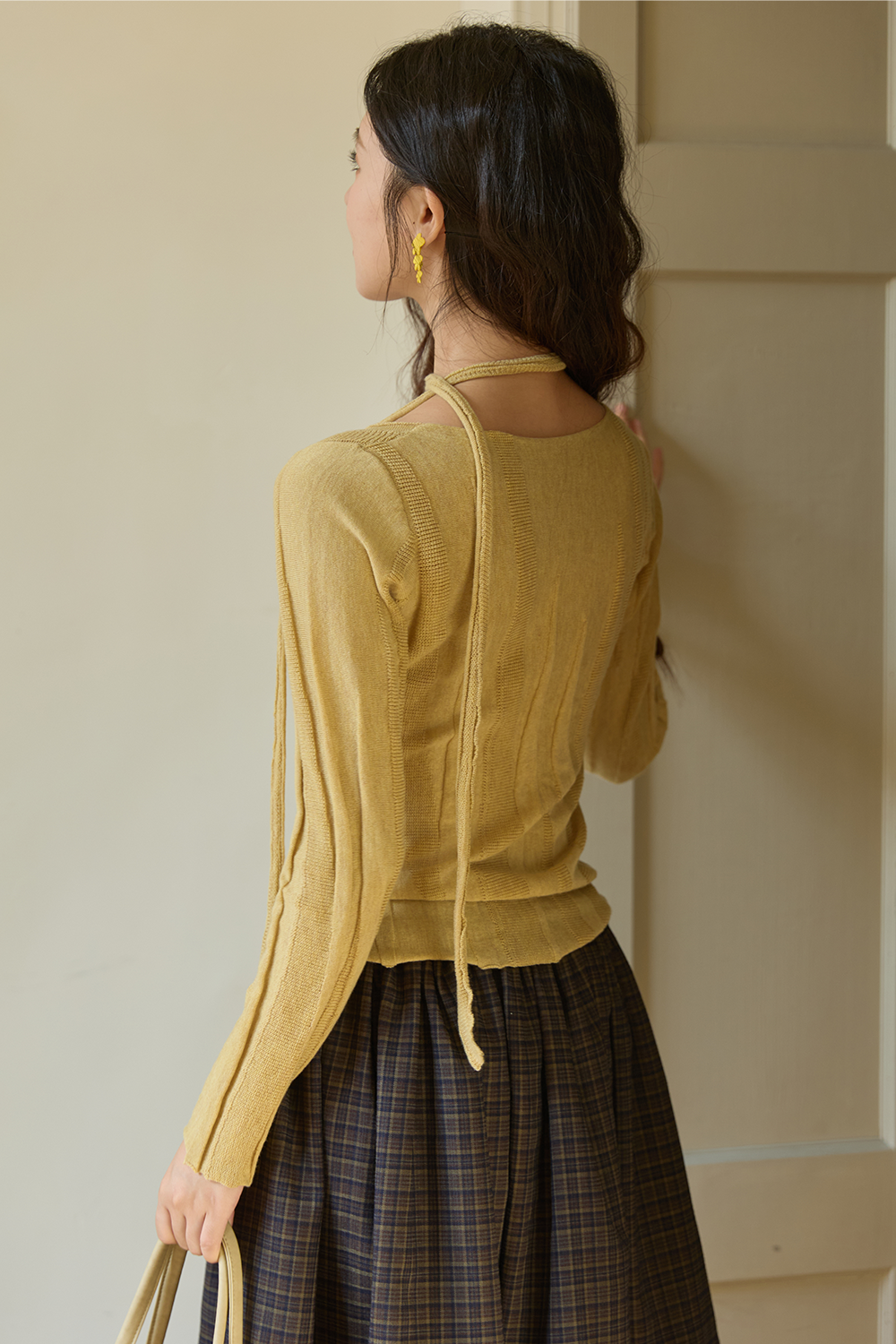 女性のためのニットシャツ