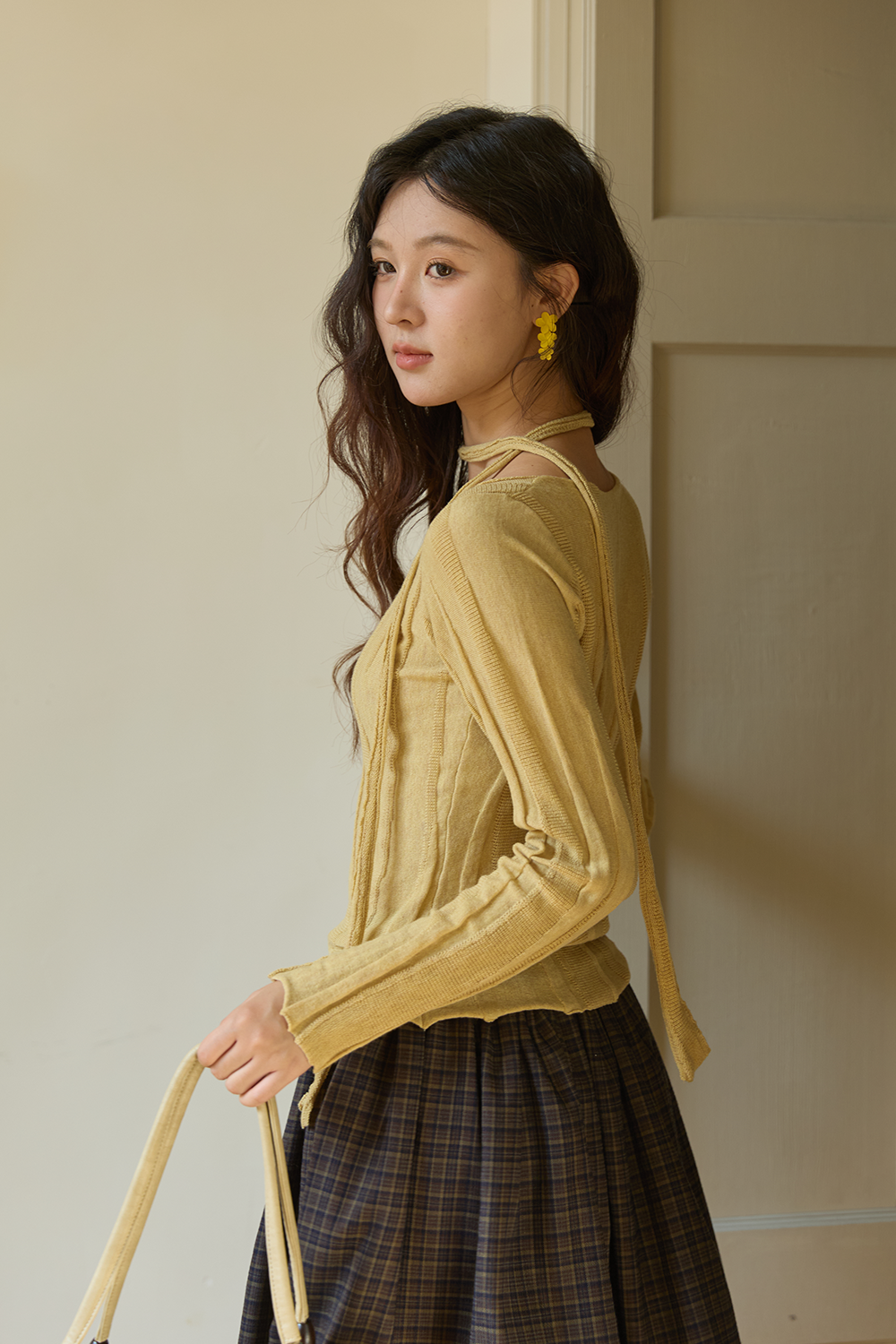女性のためのニットシャツ
