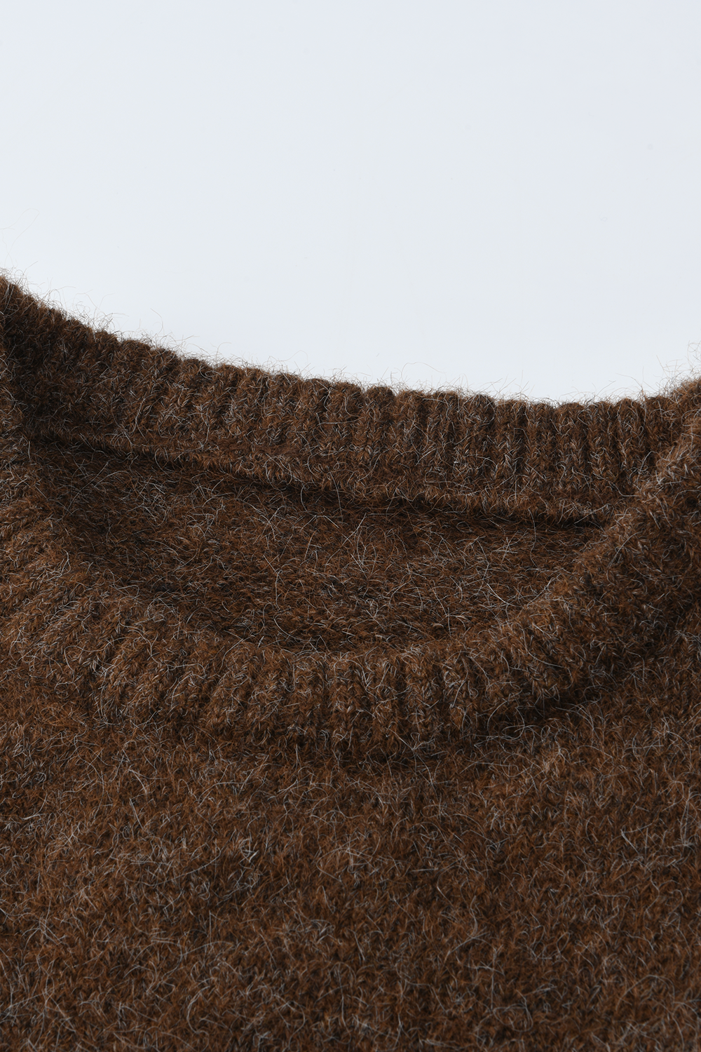 女性のためのニットシャツ