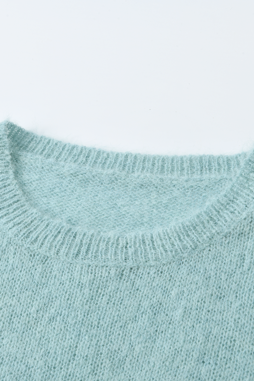 女性のためのニットシャツ