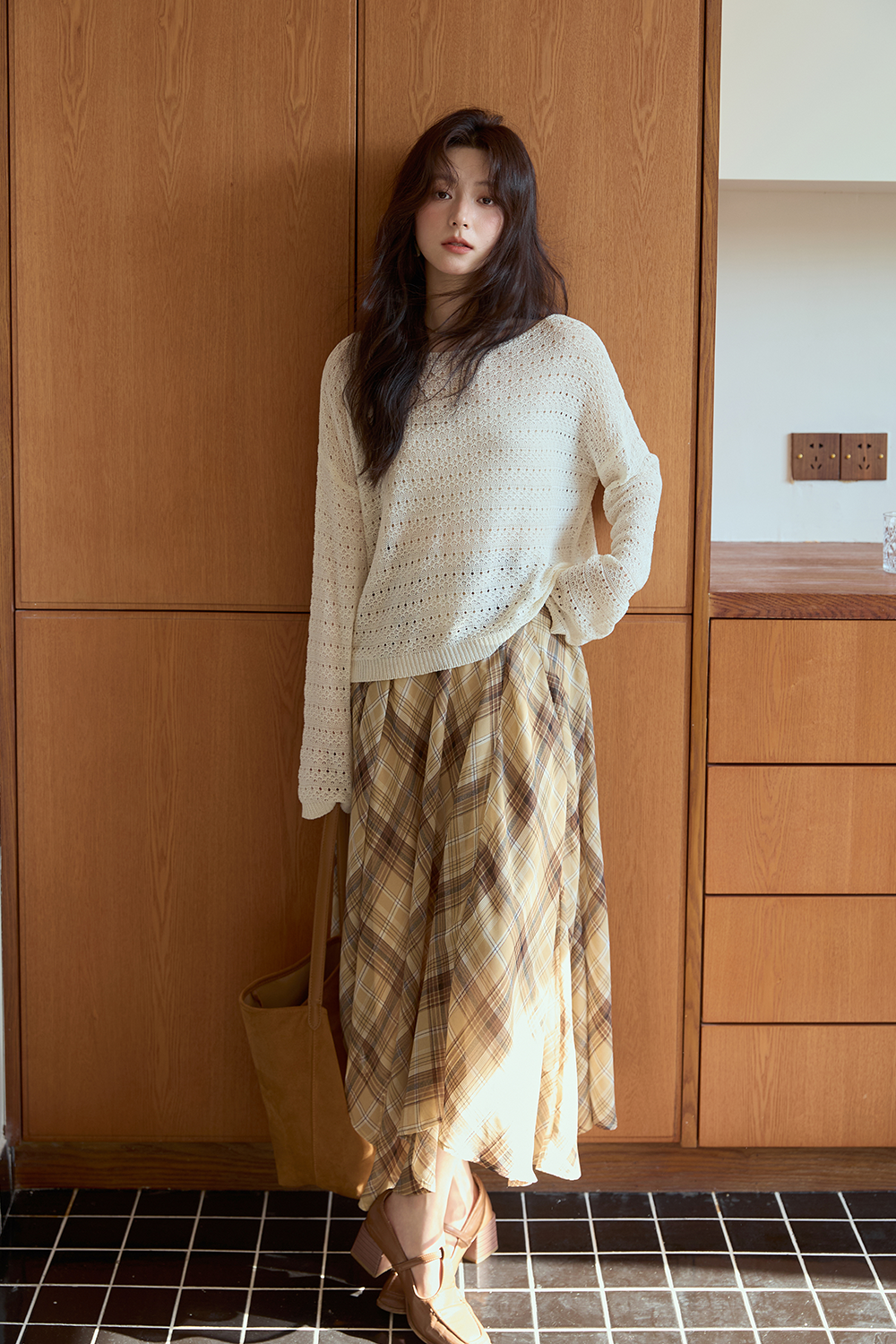 女性のためのニットシャツ