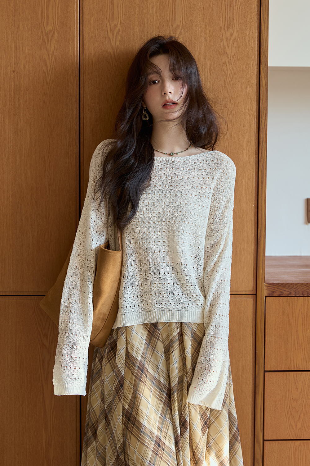 女性のためのニットシャツ