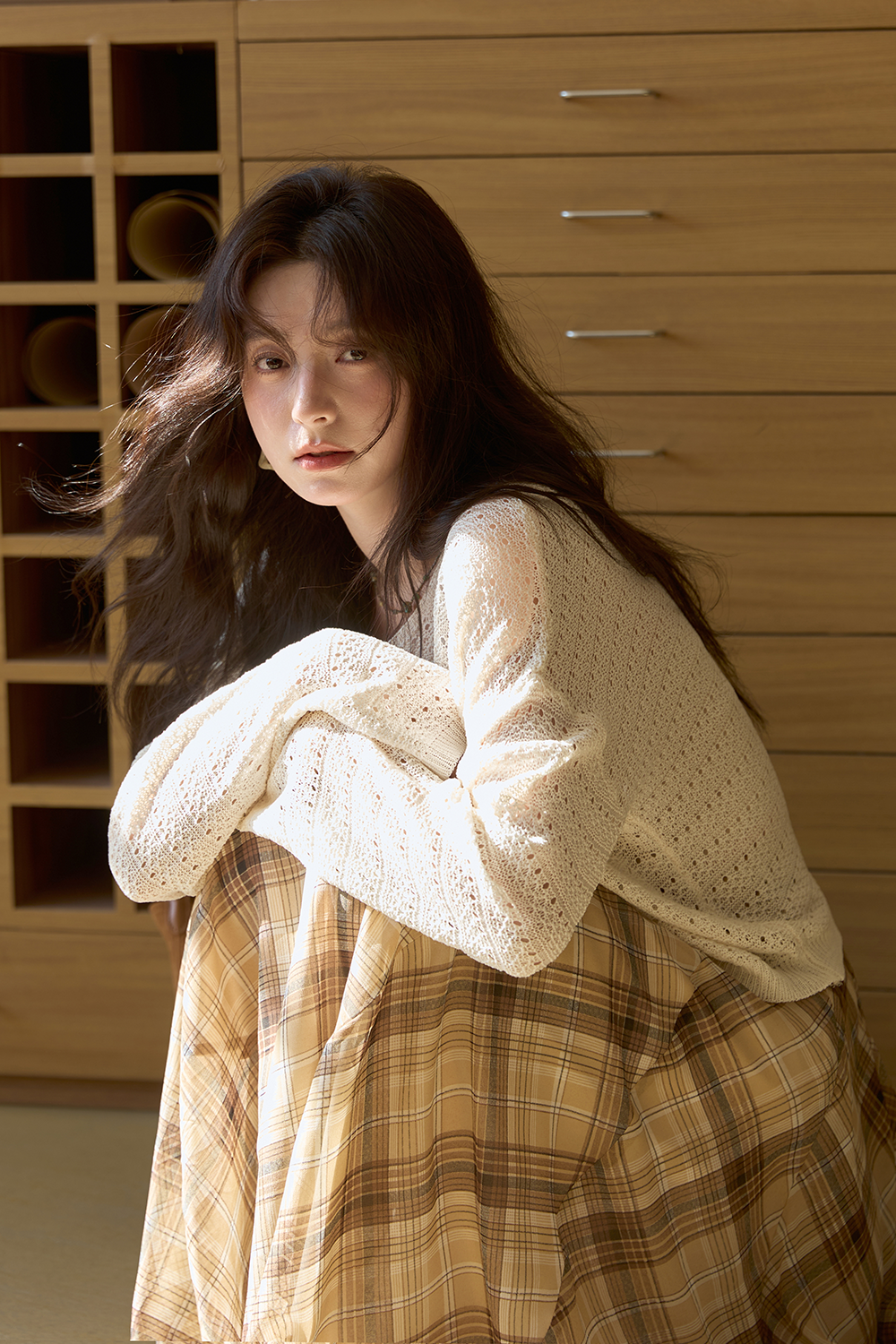 女性のためのニットシャツ