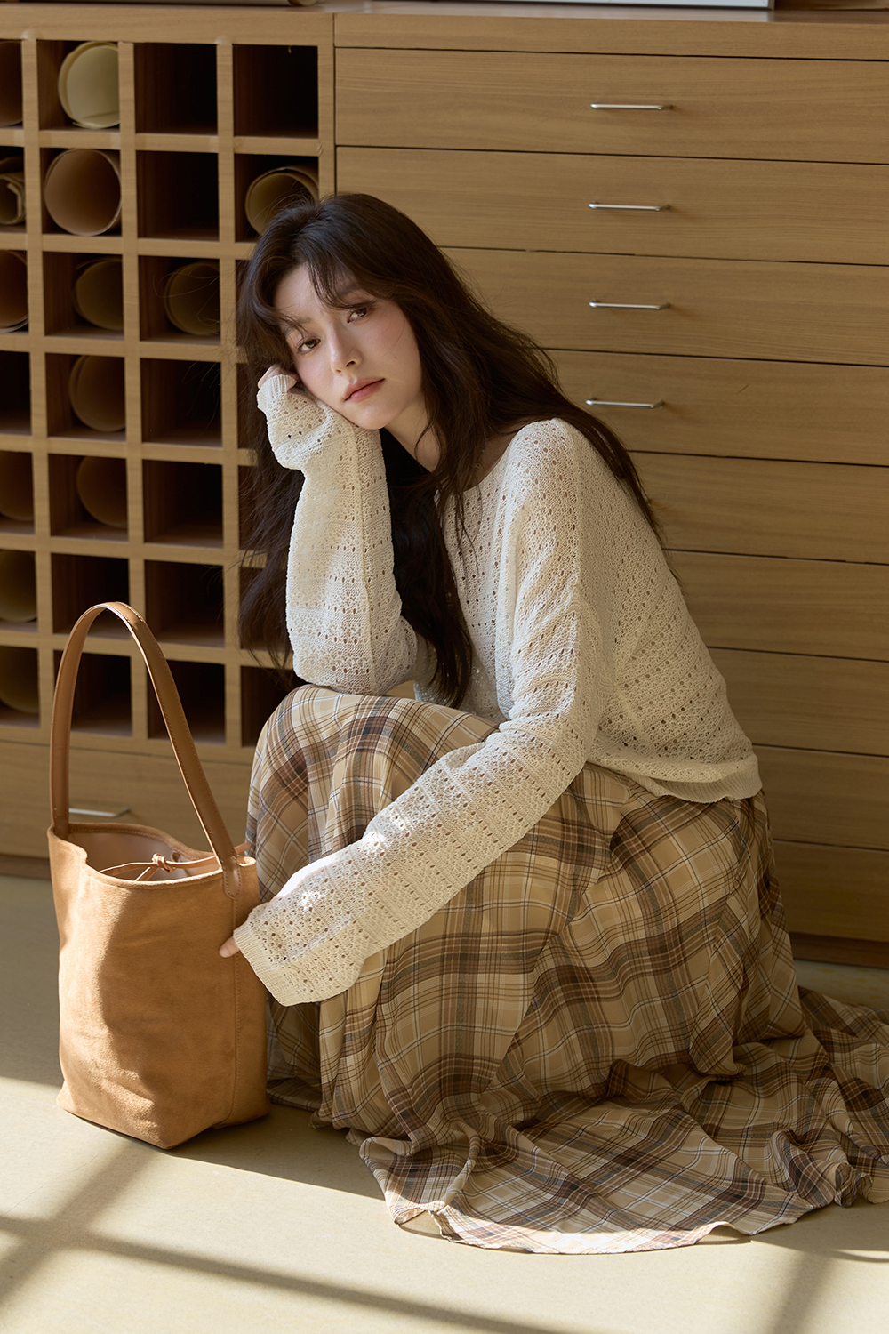 女性のためのニットシャツ