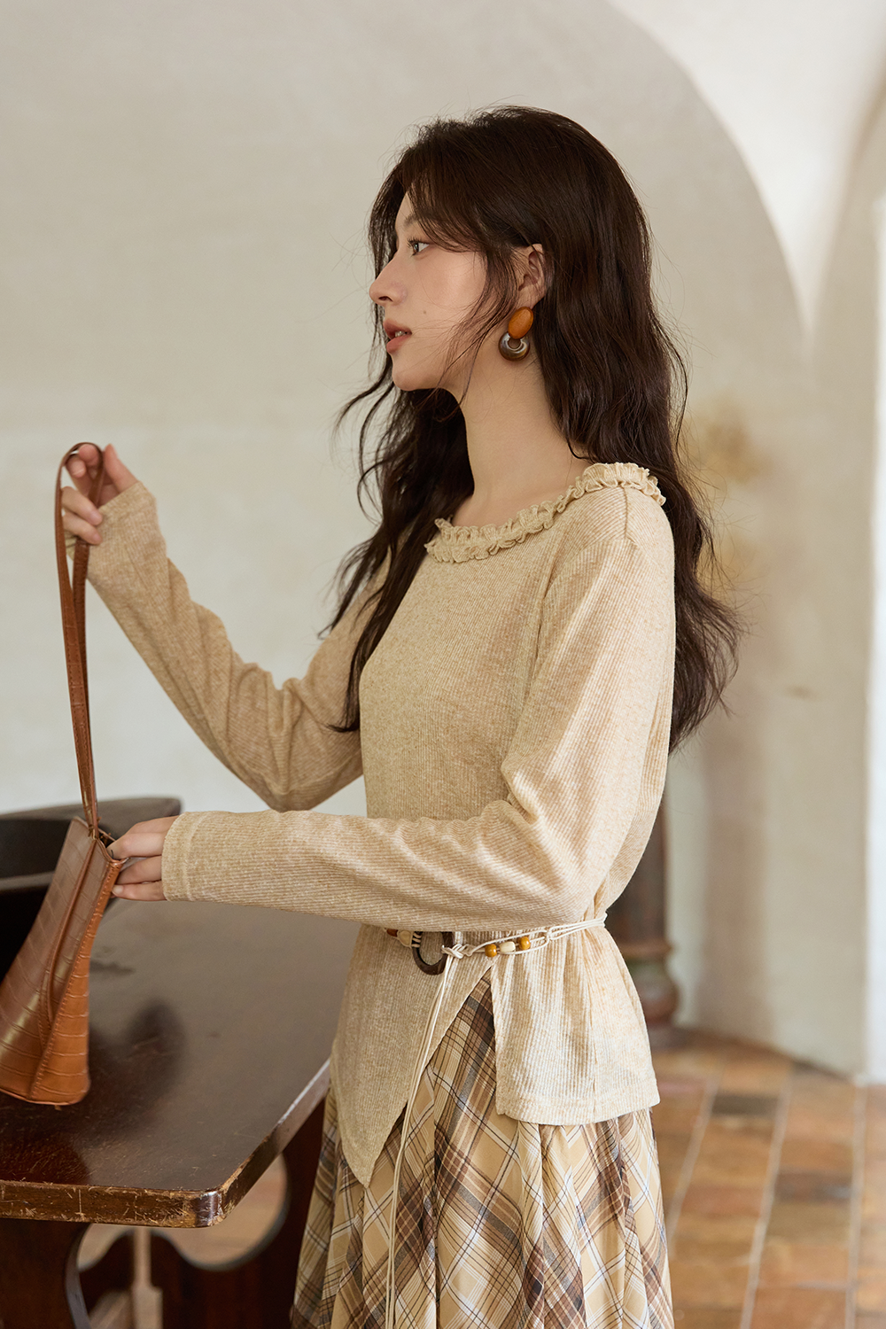 女性のためのニットシャツ