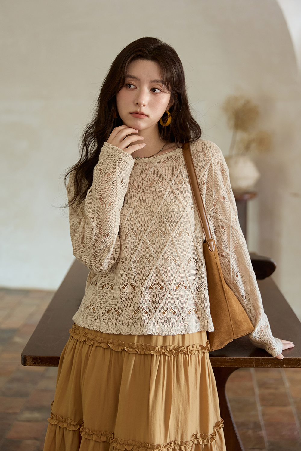 女性のためのニットシャツ