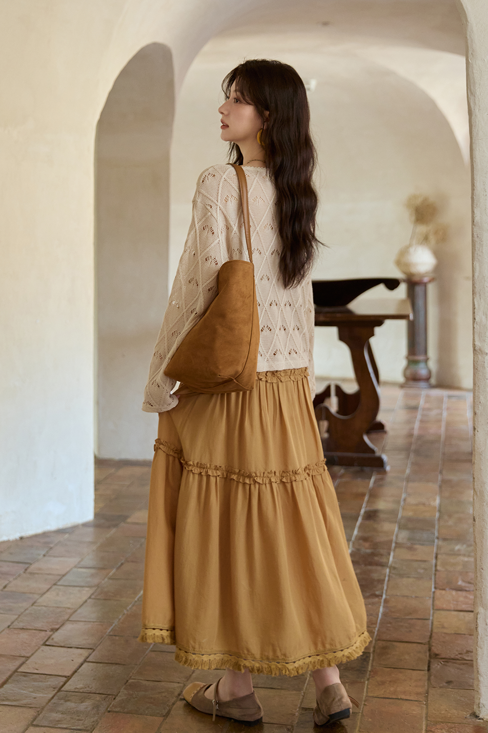 女性のためのニットシャツ
