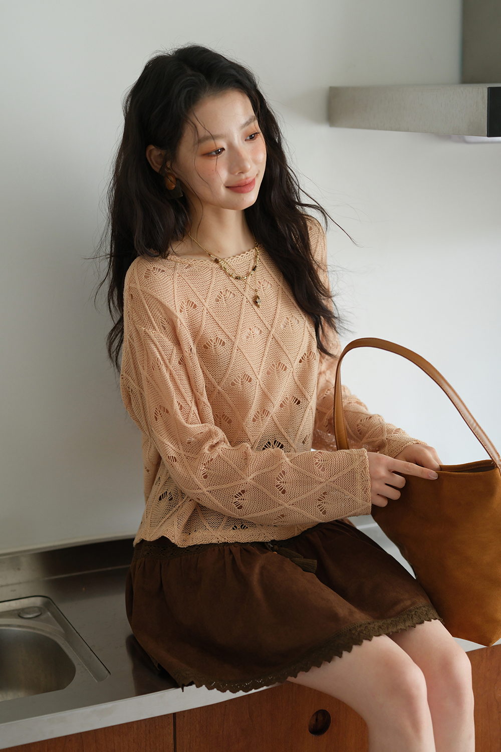 女性のためのニットシャツ