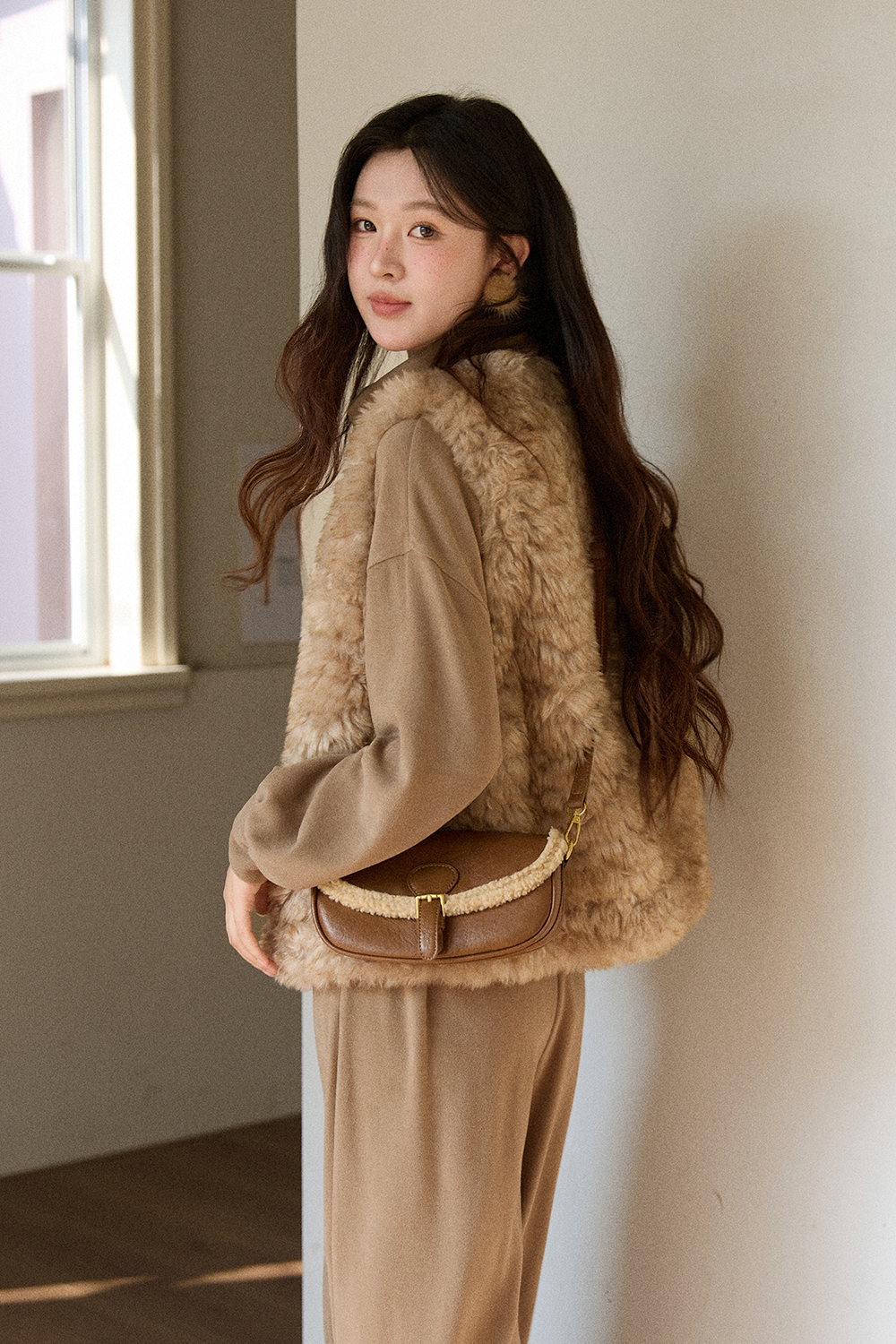 여성용 민소매 코트