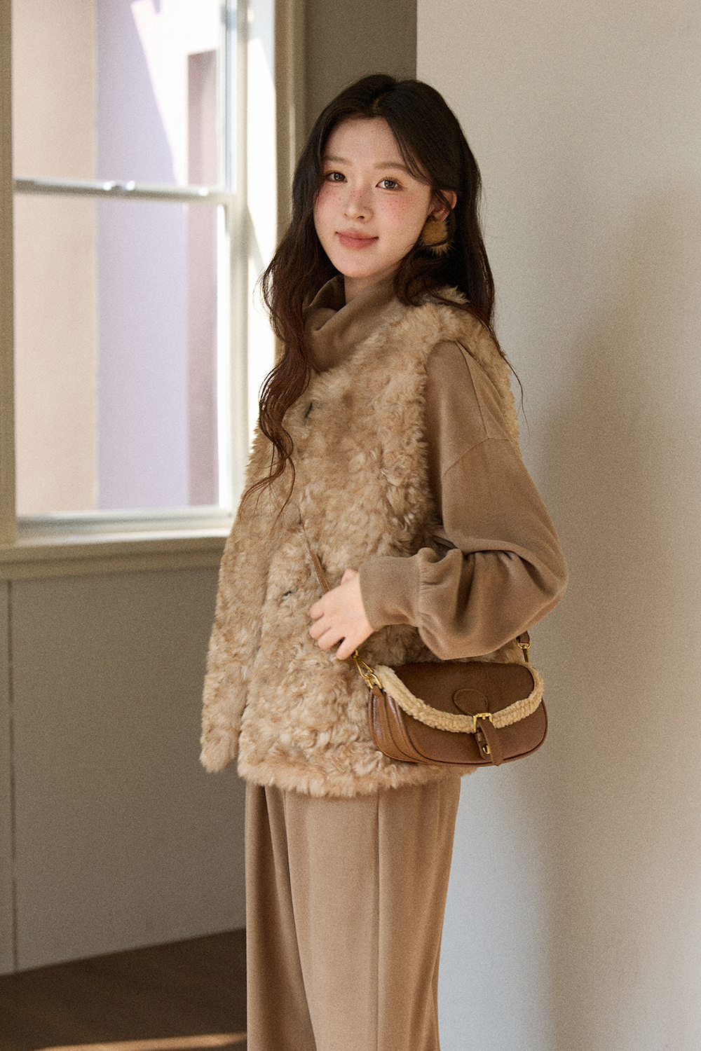 여성용 민소매 코트