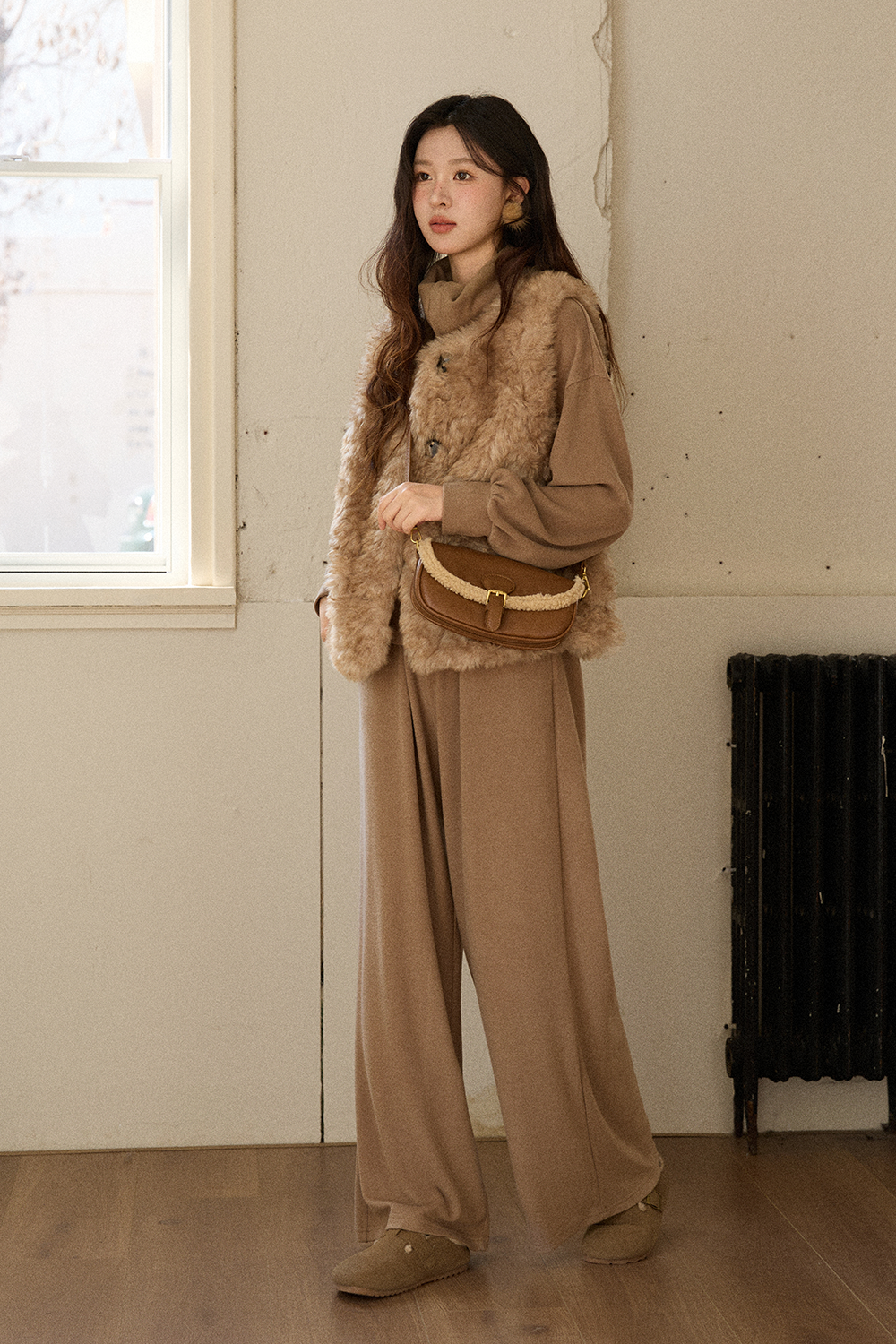 여성용 민소매 코트