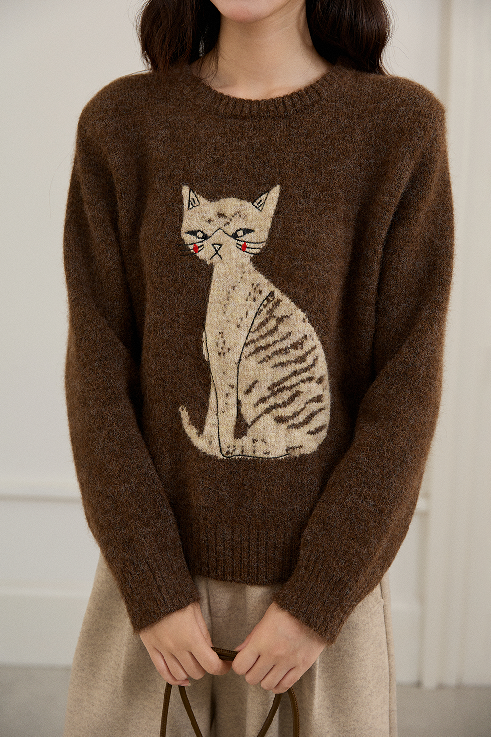 女性のためのニットシャツ