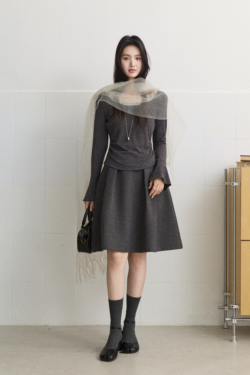女性のためのニットシャツ