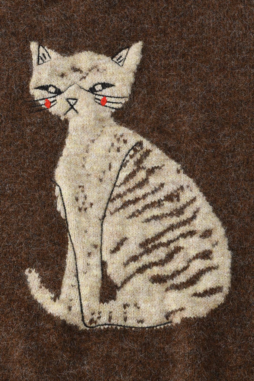 女性のためのニットシャツ