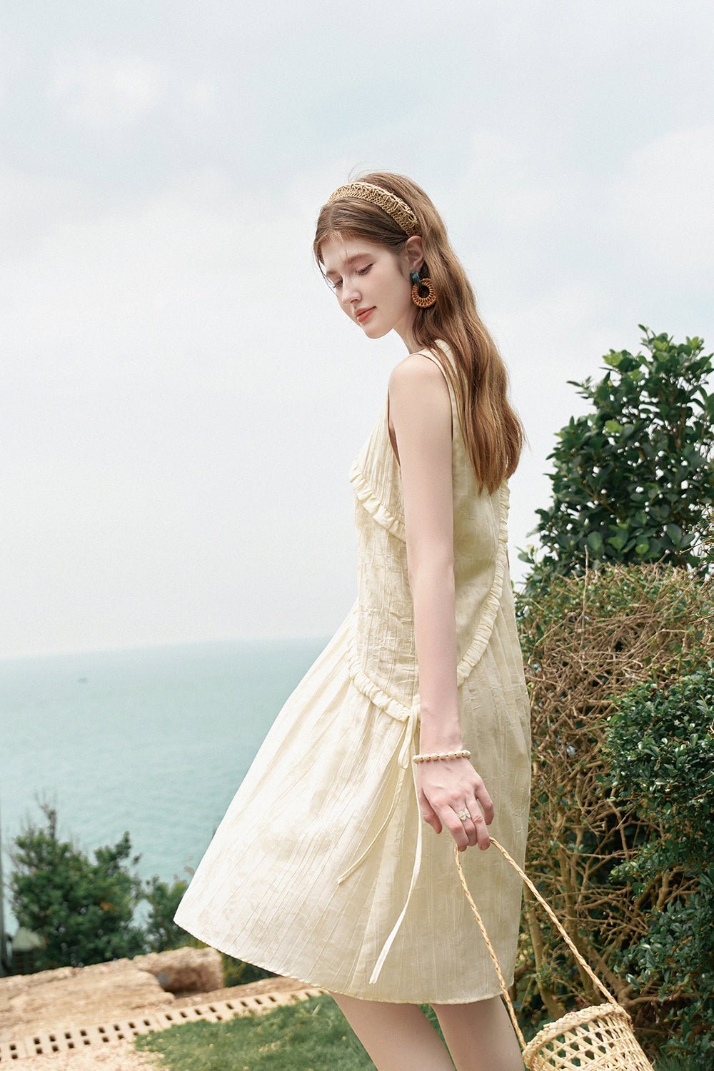 Gaun Midi Padat Tanpa Lengan Wanita