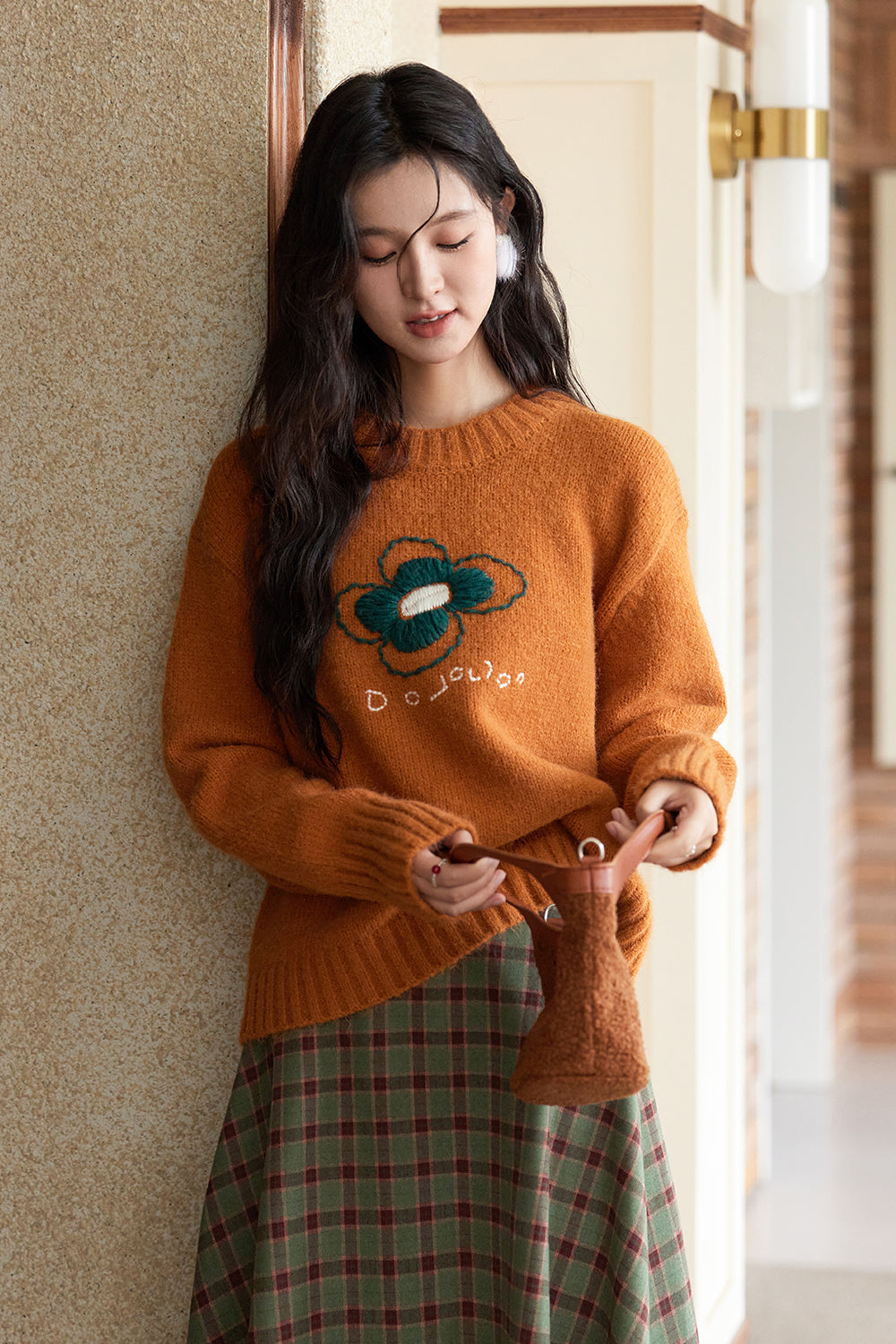 女性のためのニットシャツ