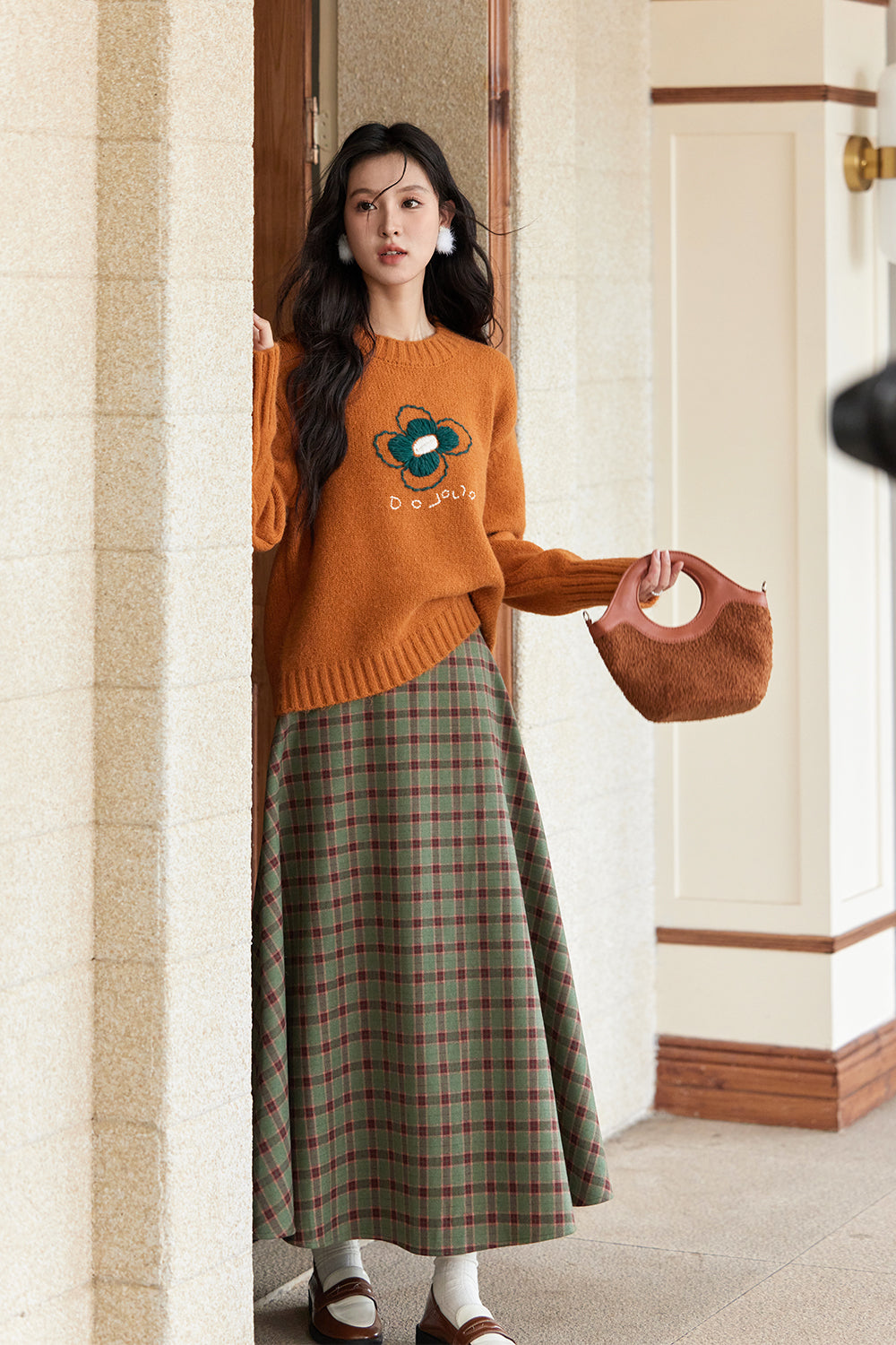 女性のためのニットシャツ