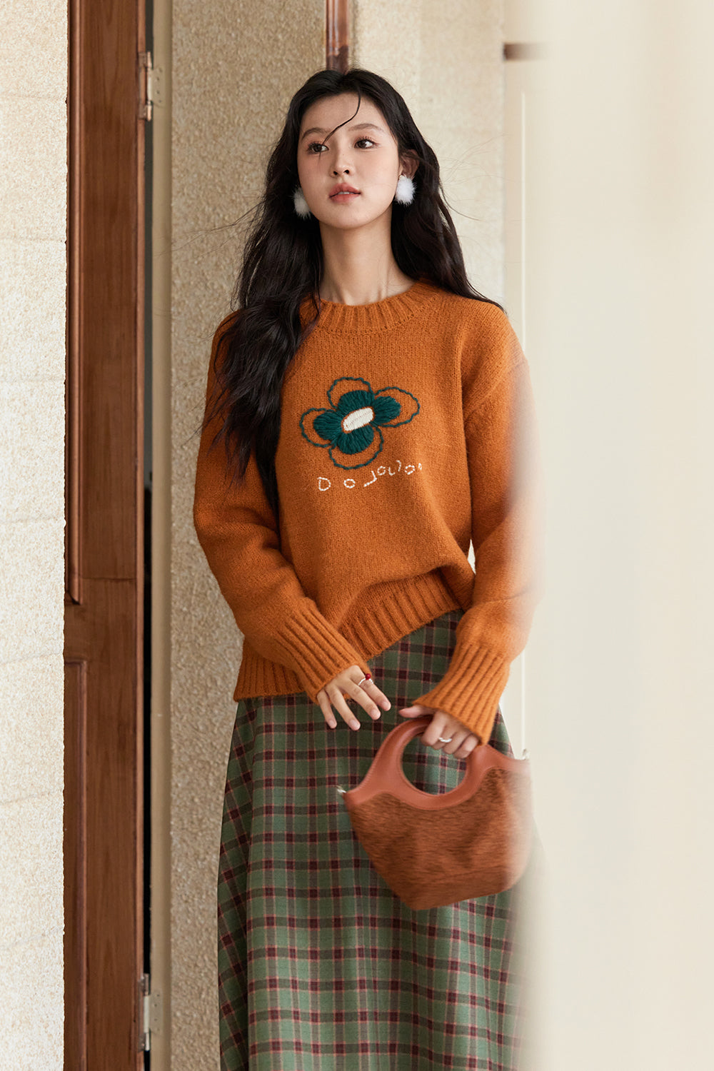 女性のためのニットシャツ