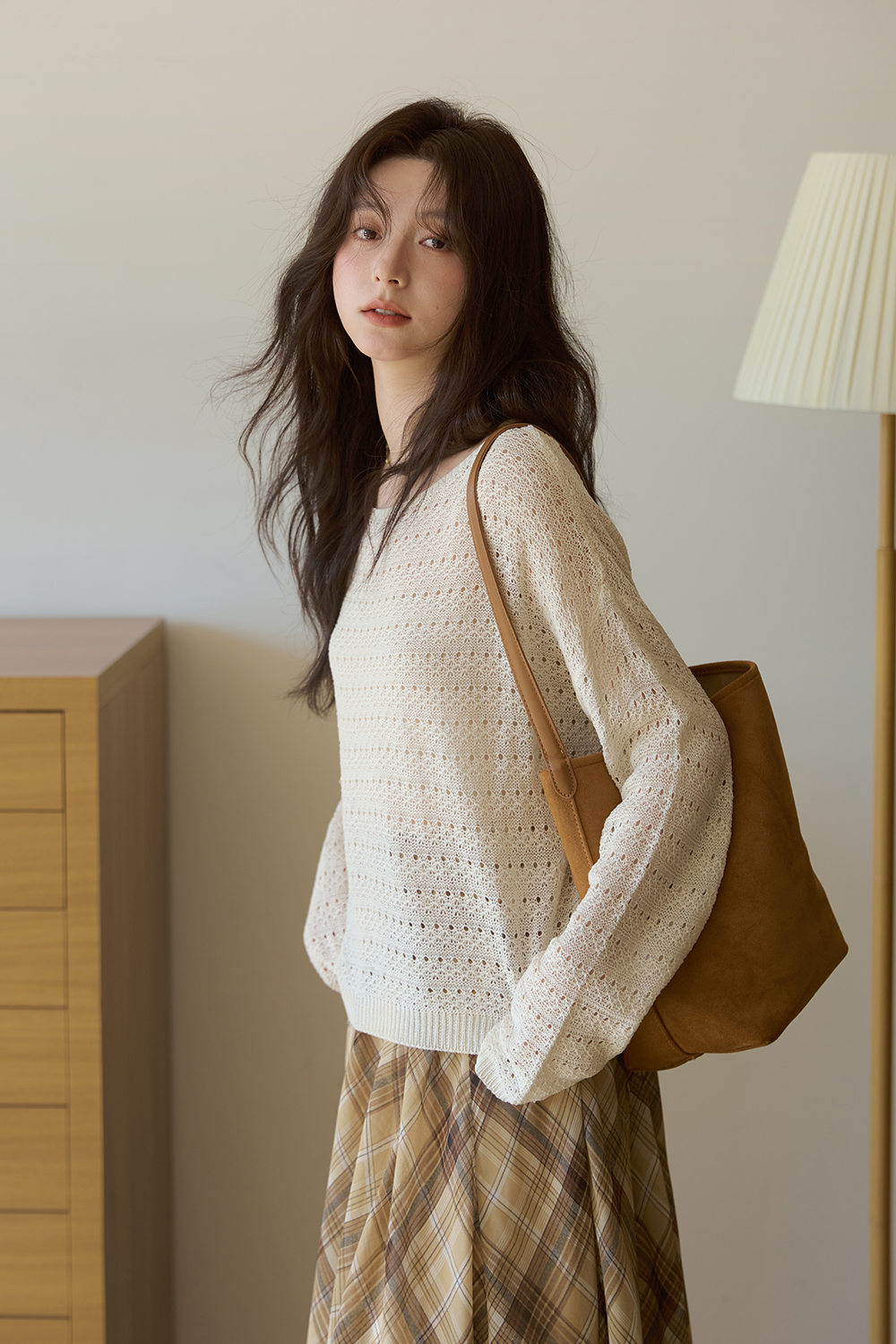女性のためのニットシャツ