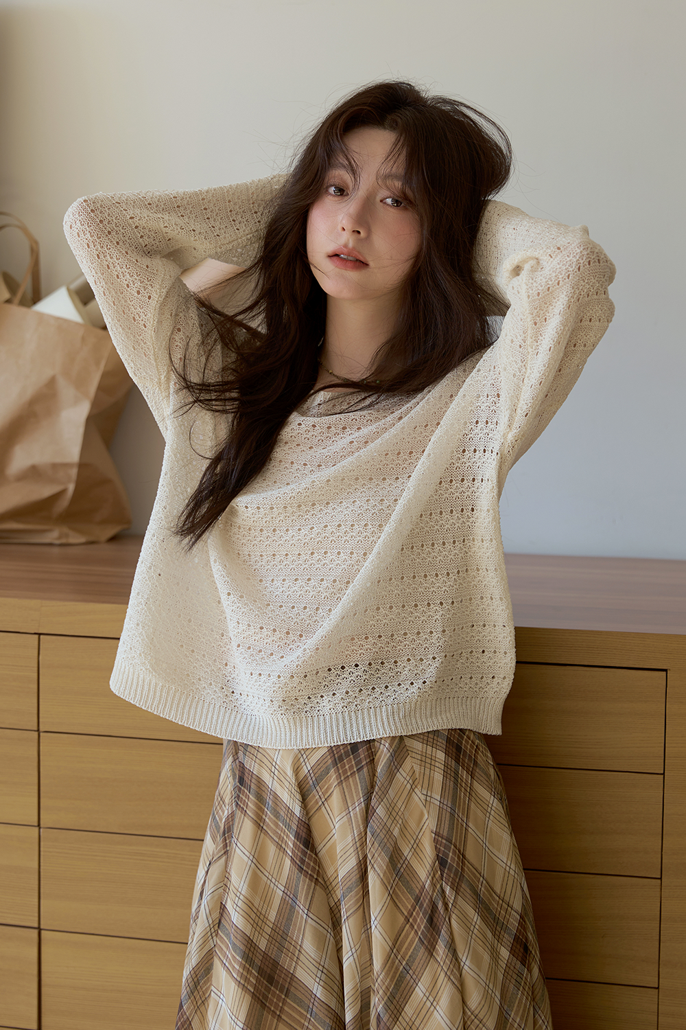 女性のためのニットシャツ