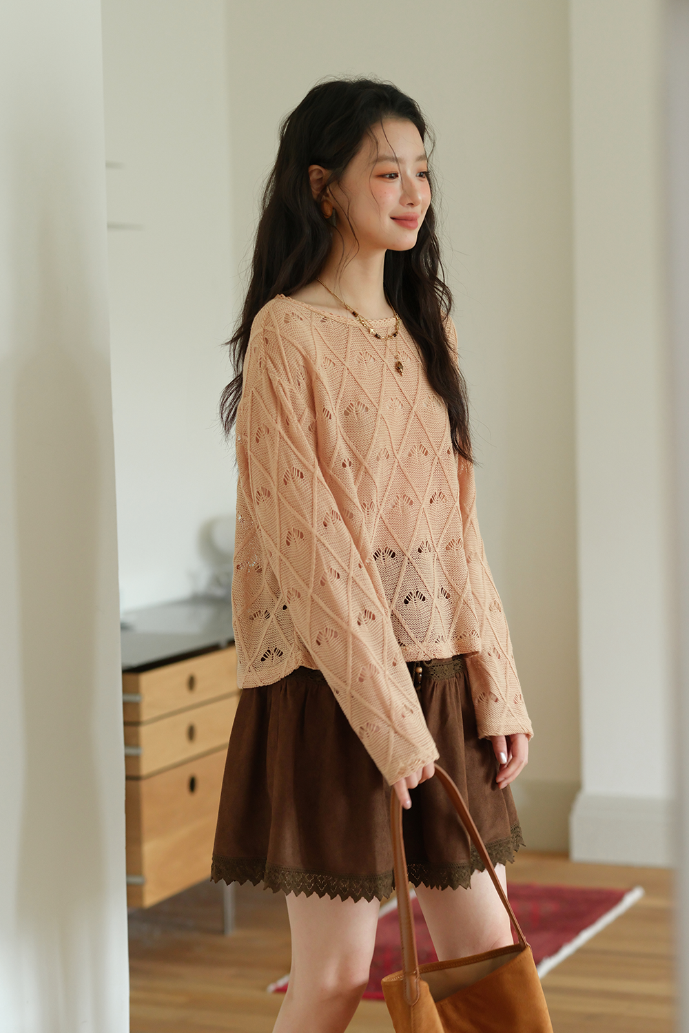 女性のためのニットシャツ