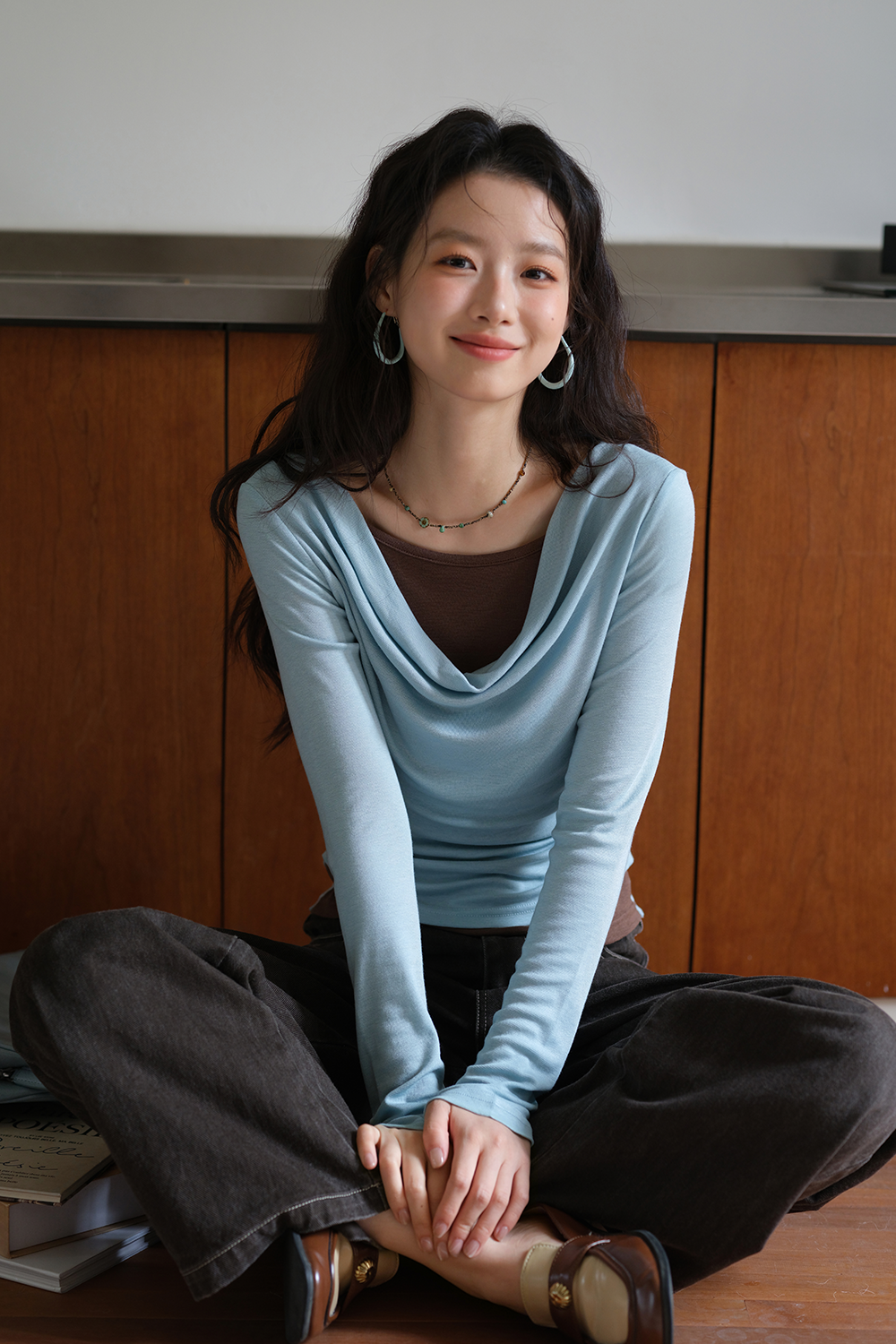 女性のためのニットシャツ