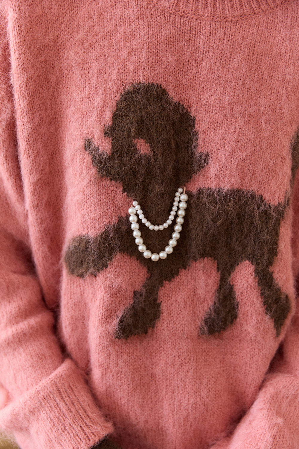 女性のためのニットシャツ