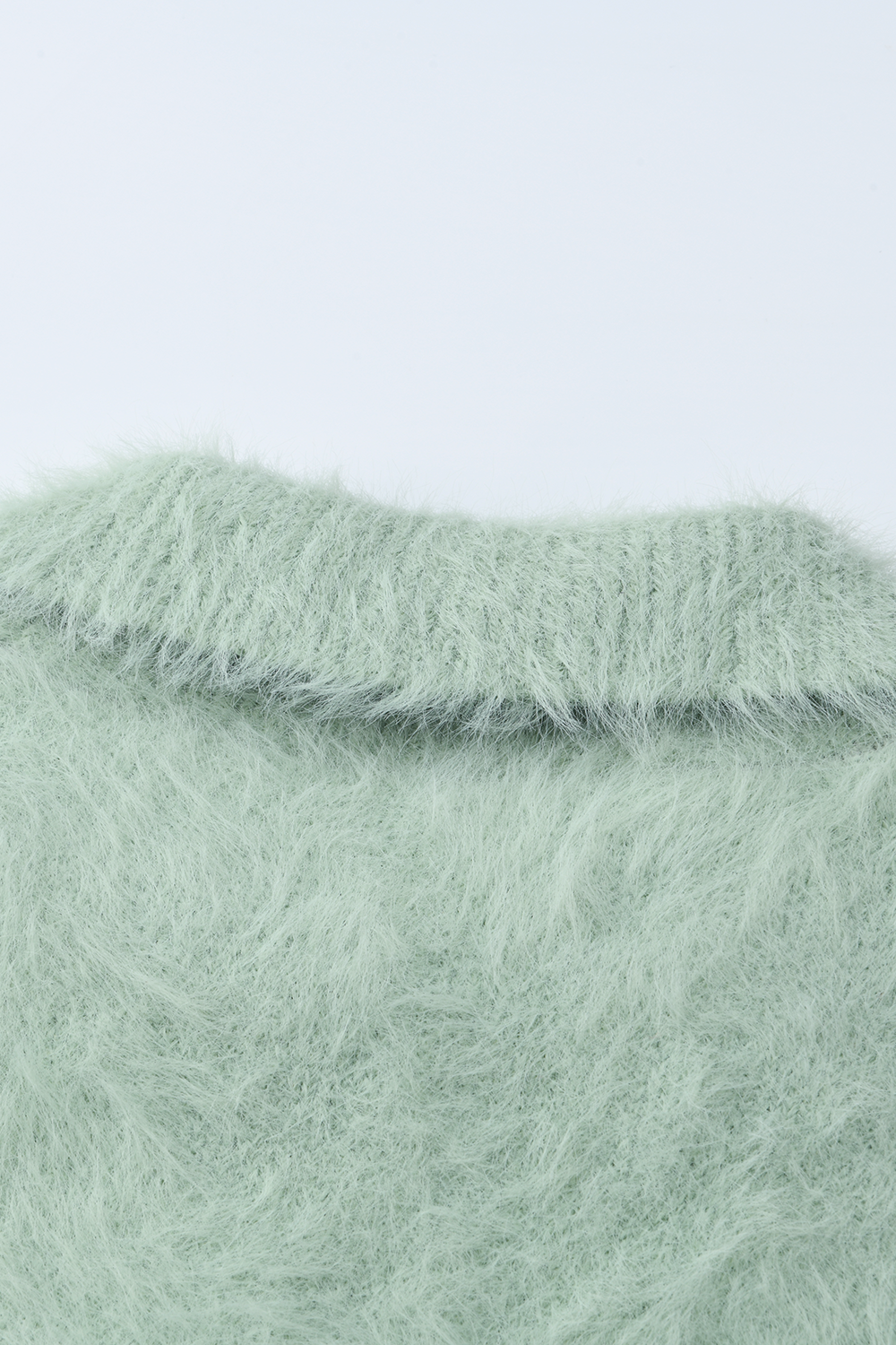 女性のためのニットシャツ